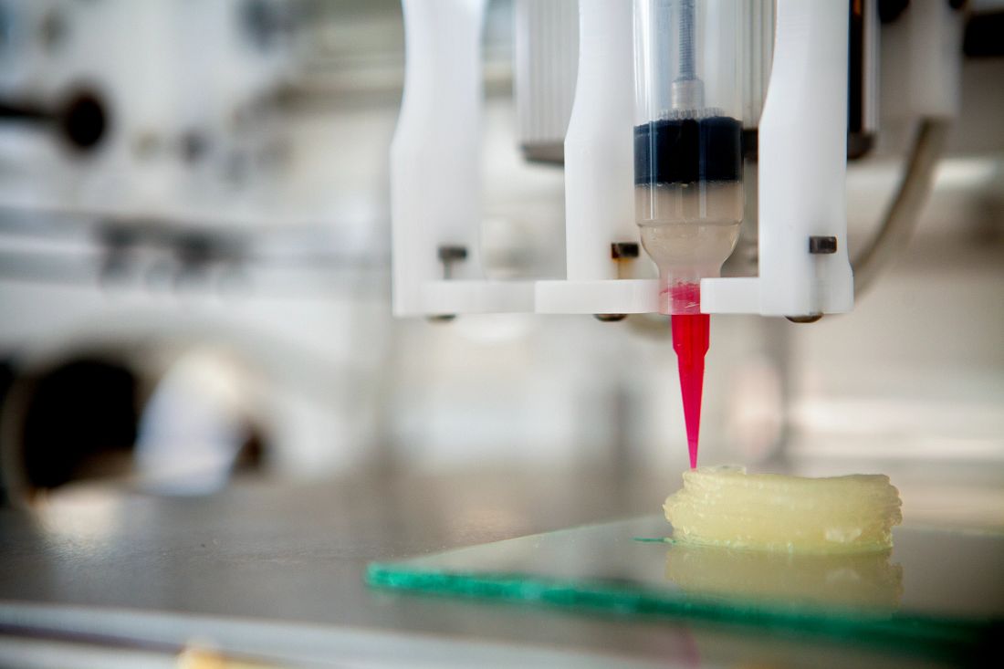 A 3-D printer in Weill Hall deposits cells encapsulated in a hydrogel that will develop into new ear tissue.