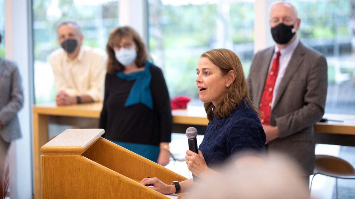Colleen Barry, dean of the Cornell Jeb E. Brooks School of Public Policy, speaks during a reception for the school Sept. 15 in Martha Van Rensselaer Hall. In the background are President Martha E. Pollack and Provost Michael Kotlikoff.